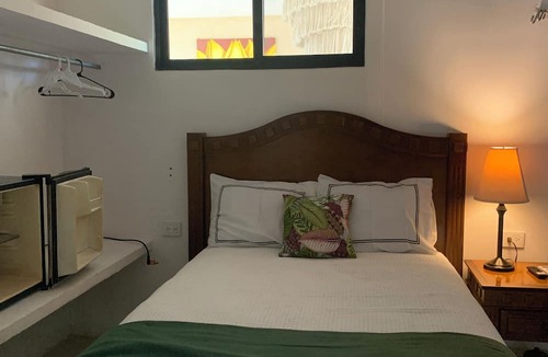 Homun Apartment | Cozy hotel suite in pleasant Homún with WiFi, AC